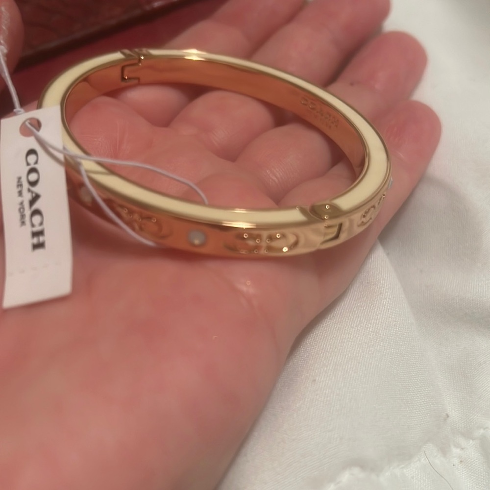 Rose gold with iridescent gems coach new with tags adjustable bangle bracelet